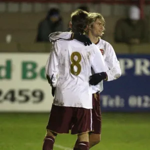 Henri Lansbury celebrates scoring Arsenals 4th goal with Mark Randall Henri Lansbury celebrates scoring Arsenals 4th goal with Mark Randall