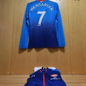 Henrikh Mkhitaryan: Gearing Up for Battle in the Arsenal Changing Room (Swansea City vs Arsenal, 2017-18) Henrikh Mkhitaryan: Gearing Up for Battle in the Arsenal Changing Room (Swansea City vs Arsenal, 2017-18)