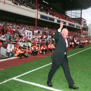 Henry Cooper (Former Boxer) walks onto the pitch for the Highbury Final Salute Ceremony Henry Cooper (Former Boxer) walks onto the pitch for the Highbury Final Salute Ceremony