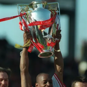 Ian Wright (Arsenal) lifts the Premiership Trophy. Arsenal v Everton