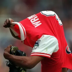 Ian Wright (Arsenal) takes off his shirt Ian Wright (Arsenal) takes off his shirt