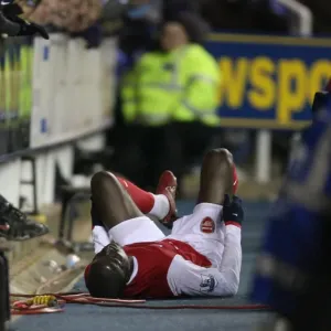 Injured Arsenal midfielder Emmanuel Eboue Injured Arsenal midfielder Emmanuel Eboue