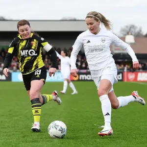 Intense Arsenal Women vs. Watford Women FA Cup Clash: Cloe Lacasse Fights for Possession