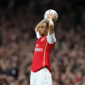 Intense Battle: Arsenal's Gael Clichy vs Liverpool in the 2008 UEFA Champions League Quarterfinal
