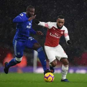 Intense Battle: Lacazette vs. Bamba - Arsenal vs. Cardiff Premier League Clash Intense Battle: Lacazette vs. Bamba - Arsenal vs. Cardiff Premier League Clash