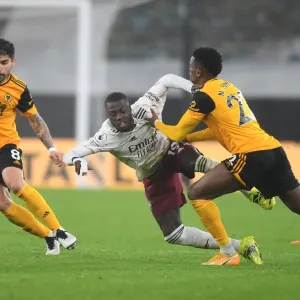Intense Battle: Pepe vs Wolves Defense - Tenacious Tackles Intense Battle: Pepe vs Wolves Defense - Tenacious Tackles