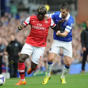Intense Battle: Sagna vs. Mirallas - Premier League Showdown, 2013/14