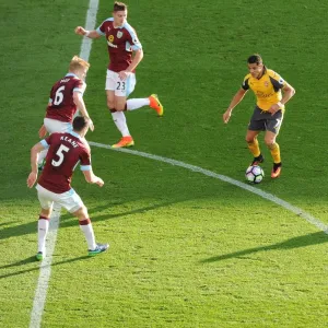 Intense Battle: Sanchez vs. Burnley's Defense - Premier League 2016-17: Alexis Sanchez Faces Off Against Stephen Ward, Ben Mee, and Michael Keane Intense Battle: Sanchez vs. Burnley's Defense - Premier League 2016-17: Alexis Sanchez Faces Off Against Stephen Ward, Ben Mee, and Michael Keane
