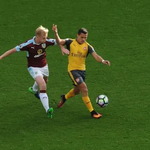Intense Battle: Sanchez vs Mee - Premier League Showdown Intense Battle: Sanchez vs Mee - Premier League Showdown