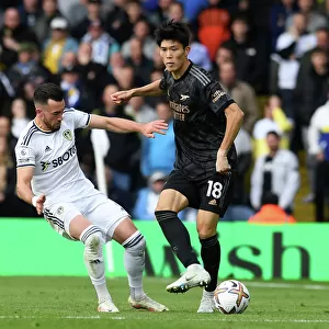 Intense Battle: Tomiyasu Under Pressure - Leeds United vs Arsenal (2022-23)