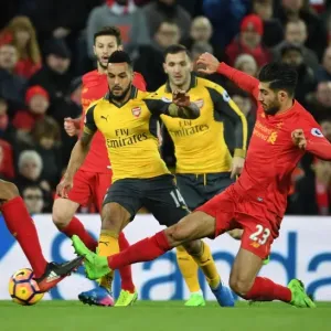 Intense Battle: Walcott vs. Liverpool's Defense - Walcott Takes on Matip and Can at Anfield, Premier League 2016-17 Intense Battle: Walcott vs. Liverpool's Defense - Walcott Takes on Matip and Can at Anfield, Premier League 2016-17