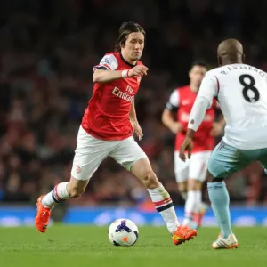 Intense Clash: Rosicky vs. Armero - Premier League Battle at Emirates Stadium Intense Clash: Rosicky vs. Armero - Premier League Battle at Emirates Stadium