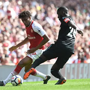 Intense Face-Off: Iwobi vs. Masuaku in Arsenal vs. West Ham Clash
