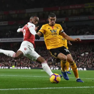 Intense Face-Off: Lacazette vs. Coady in Arsenal's Premier League Battle