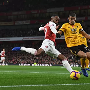 Intense Face-Off: Lacazette vs. Coady in Arsenal's Premier League Battle
