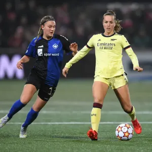 Intense Moment: Lia Walti Battles Under Pressure in Arsenal Women's UEFA Champions League Clash vs. HB Koge