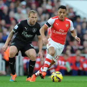 Intense Rivalry: Alexis Sanchez vs. Scott Arfield - Arsenal's Battle Against Burnley Intense Rivalry: Alexis Sanchez vs. Scott Arfield - Arsenal's Battle Against Burnley