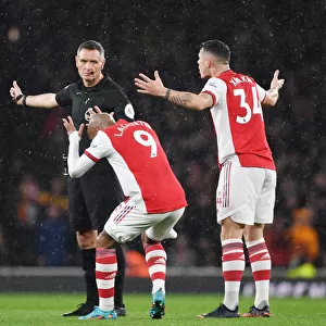 Intense Rivalry: Arsenal's Lacazette and Xhaka React to Referee Decision Amidst Arsenal vs. Liverpool Controversy (2021-22)