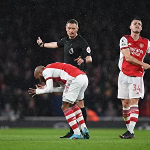 Intense Rivalry: Arsenal's Lacazette and Xhaka's Reaction to Referee Decision Amidst Arsenal vs. Liverpool Controversy (2021-22)