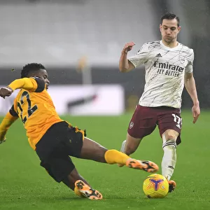 Intense Rivalry: Cedric Soares vs Nelson Semedo Battle at Wolverhampton Wanderers vs Arsenal