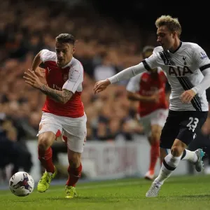 Intense Rivalry: Debuchy vs. Eriksen in the Battle of the Capital One Cup: Tottenham vs. Arsenal Intense Rivalry: Debuchy vs. Eriksen in the Battle of the Capital One Cup: Tottenham vs. Arsenal