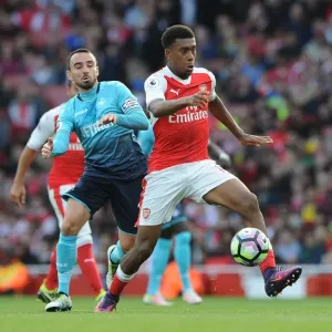 Intense Rivalry: Iwobi vs Britton in Arsenal vs Swansea Premier League Clash