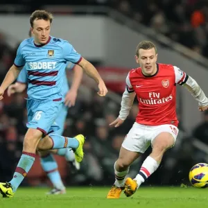 Intense Rivalry: Jack Wilshere vs. Mark Noble Battle in Arsenal vs. West Ham Showdown