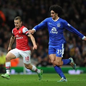 Intense Rivalry: Jack Wilshere vs. Marouane Fallaini Clash in Arsenal vs. Everton Premier League Match