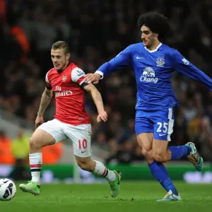 Intense Rivalry: Jack Wilshere vs. Marouane Fallaini Clash in Arsenal vs. Everton Premier League Match