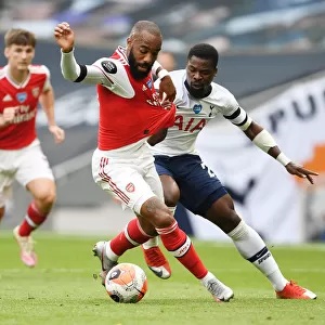 Intense Rivalry: Lacazette Fouls Aurier in Premier League Showdown (Tottenham vs. Arsenal, 2019-20)