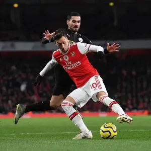 Intense Rivalry: Ozil vs. Gundogan - Arsenal vs. Manchester City Showdown Intense Rivalry: Ozil vs. Gundogan - Arsenal vs. Manchester City Showdown
