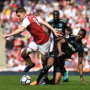 Intense Rivalry: Ramsey vs. Fernandes Clash in Arsenal vs. West Ham Football Match Intense Rivalry: Ramsey vs. Fernandes Clash in Arsenal vs. West Ham Football Match
