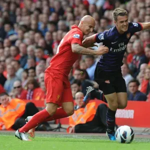 Intense Rivalry: Ramsey vs. Shelvey Clash at Anfield - Premier League 2012-13 Intense Rivalry: Ramsey vs. Shelvey Clash at Anfield - Premier League 2012-13