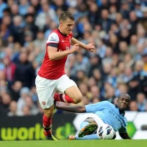 Intense Rivalry: Ramsey vs Toure Battle at Etihad Stadium (1:1)