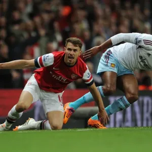 Intense Rivalry: Ramsey vs. Vaz Te Clash in Arsenal's Battle against West Ham Intense Rivalry: Ramsey vs. Vaz Te Clash in Arsenal's Battle against West Ham