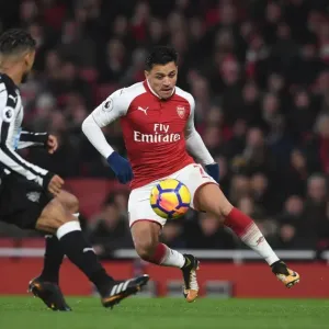 Intense Rivalry: Sanchez vs. Yedlin in Arsenal's Clash with Newcastle United