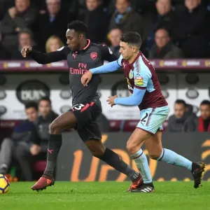 Intense Rivalry: Welbeck vs. Lowton in the Burnley vs. Arsenal Premier League Clash