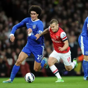 Intense Rivalry: Wilshere vs. Fallaini Clash in Arsenal vs. Everton Premier League Match