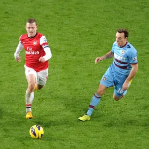 Intense Rivalry: Wilshere vs. Noble - Arsenal vs. West Ham Showdown