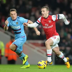 Intense Rivalry: Wilshere vs. Noble Clash in Arsenal vs. West Ham Showdown