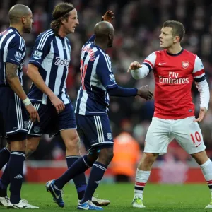 Intense Rivalry: Wilshere vs. Reid, Olsson, and Mulumbu Clash in Arsenal vs. West Bromwich Albion Showdown