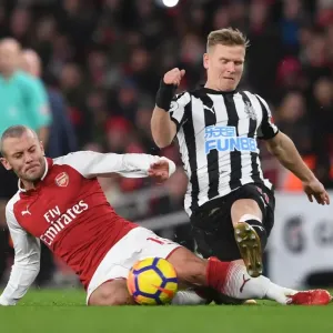 Intense Rivalry: Wilshere vs Ritchie in Arsenal vs Newcastle United Premier League Showdown