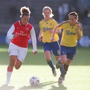 Intense Semi-Final Showdown: Lianne Sanderson vs. Julie Rydahl Bukh in the UEFA Women's Cup Match between Arsenal and Brondby Intense Semi-Final Showdown: Lianne Sanderson vs. Julie Rydahl Bukh in the UEFA Women's Cup Match between Arsenal and Brondby