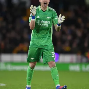 Intense Showdown: Aaron Ramsdale of Arsenal vs. Wolverhampton Wanderers in the Premier League