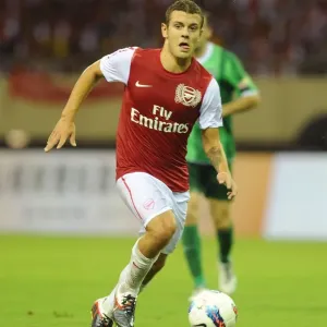 Jack Wilshere in Action: Arsenal vs Hangzhou Greentown, China (2011) Jack Wilshere in Action: Arsenal vs Hangzhou Greentown, China (2011)