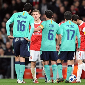 Jack Wilshere (Arsenal) chats to Sergio Busquets and Xavi (Barcelona). Arsenal 2
