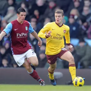 Jack Wilshere (Arsenal) Ciaran Clark (Villa). Aston Villa 2: 4 Arsenal. Barclays Premier League Jack Wilshere (Arsenal) Ciaran Clark (Villa). Aston Villa 2: 4 Arsenal. Barclays Premier League