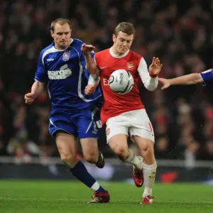 Jack Wilshere (Arsenal) Colin Healy and Mark Kennedy (Ipswich). Arsenal 3 Jack Wilshere (Arsenal) Colin Healy and Mark Kennedy (Ipswich). Arsenal 3