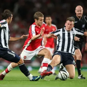 Jack Wilshere (Arsenal) Filipe Teixeira and Somin Cox (WBA) Jack Wilshere (Arsenal) Filipe Teixeira and Somin Cox (WBA)