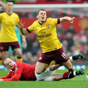 Jack Wilshere (Arsenal) is fouled by Wayne Rooney (Man Utd). Manchester United 2